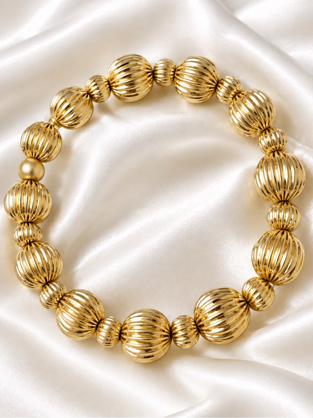 Fashion Jewelry Gold Ribbed Bead Bracelet.